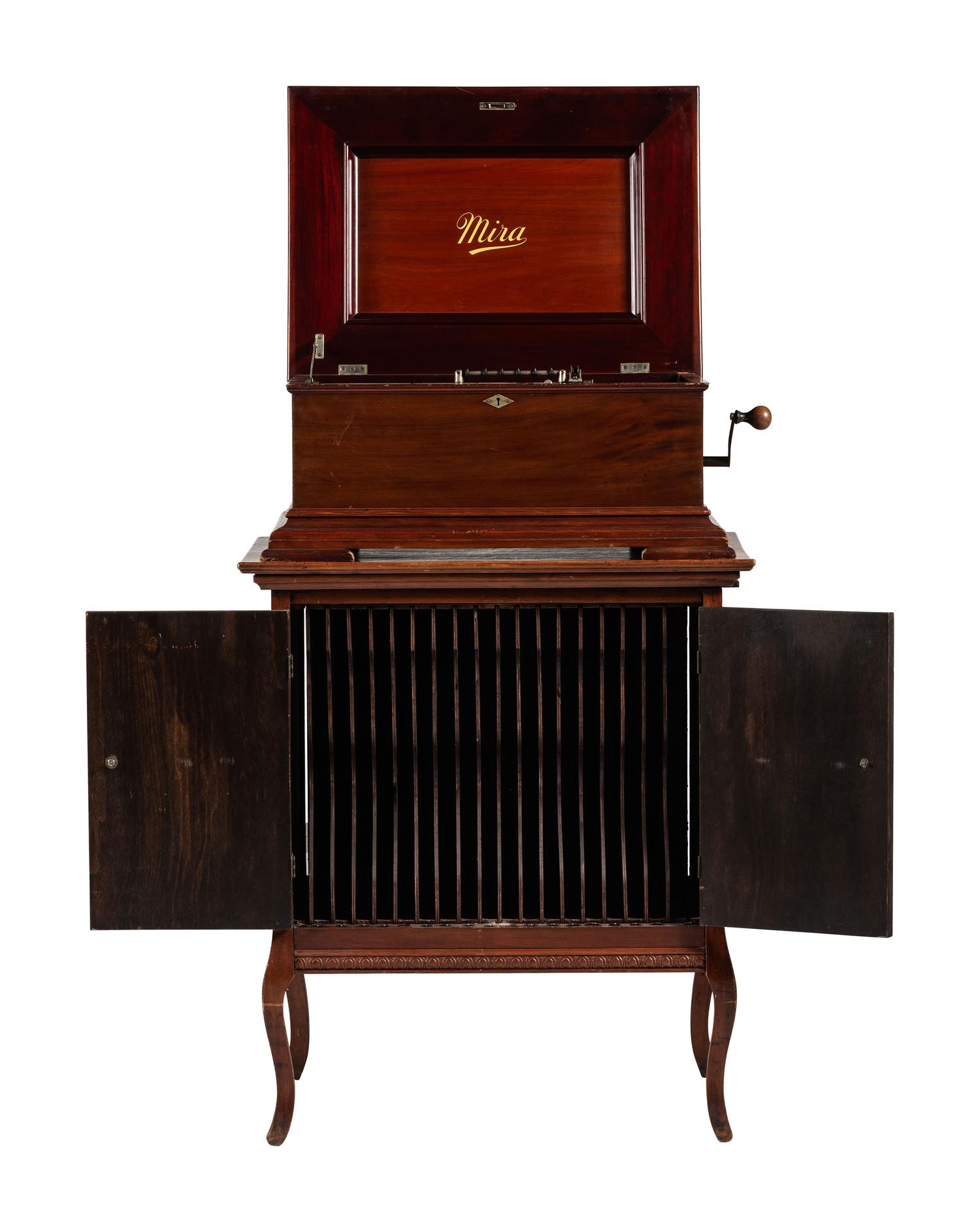 A Mira Mahogany-Cased Disc Music Box and Cabinet