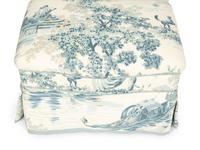 A Blue, White and Cream Upholstered Club Chair and Ottoman