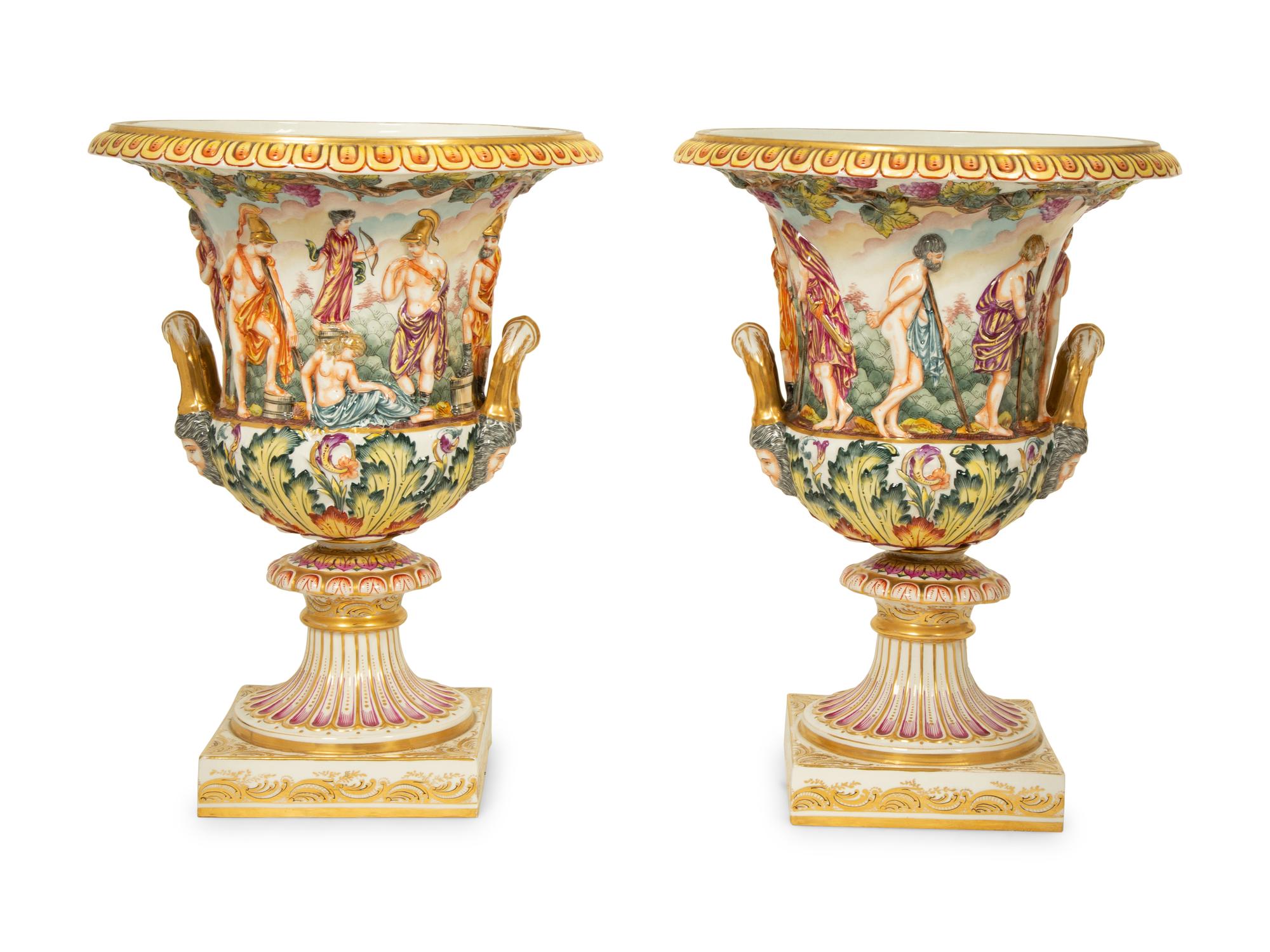 A Pair of Capodimonti Campana-Form Relief Molded Urns — 19TH CENTURY