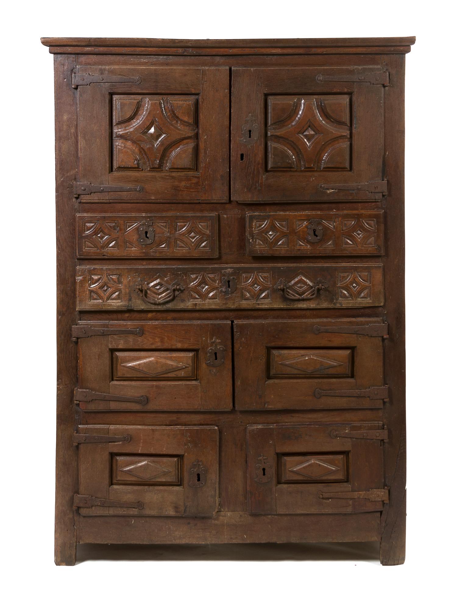 A Spanish Colonial Hardwood Cabinet, Height 76 x width 52 1/2 x depth 25 3/4 inches.