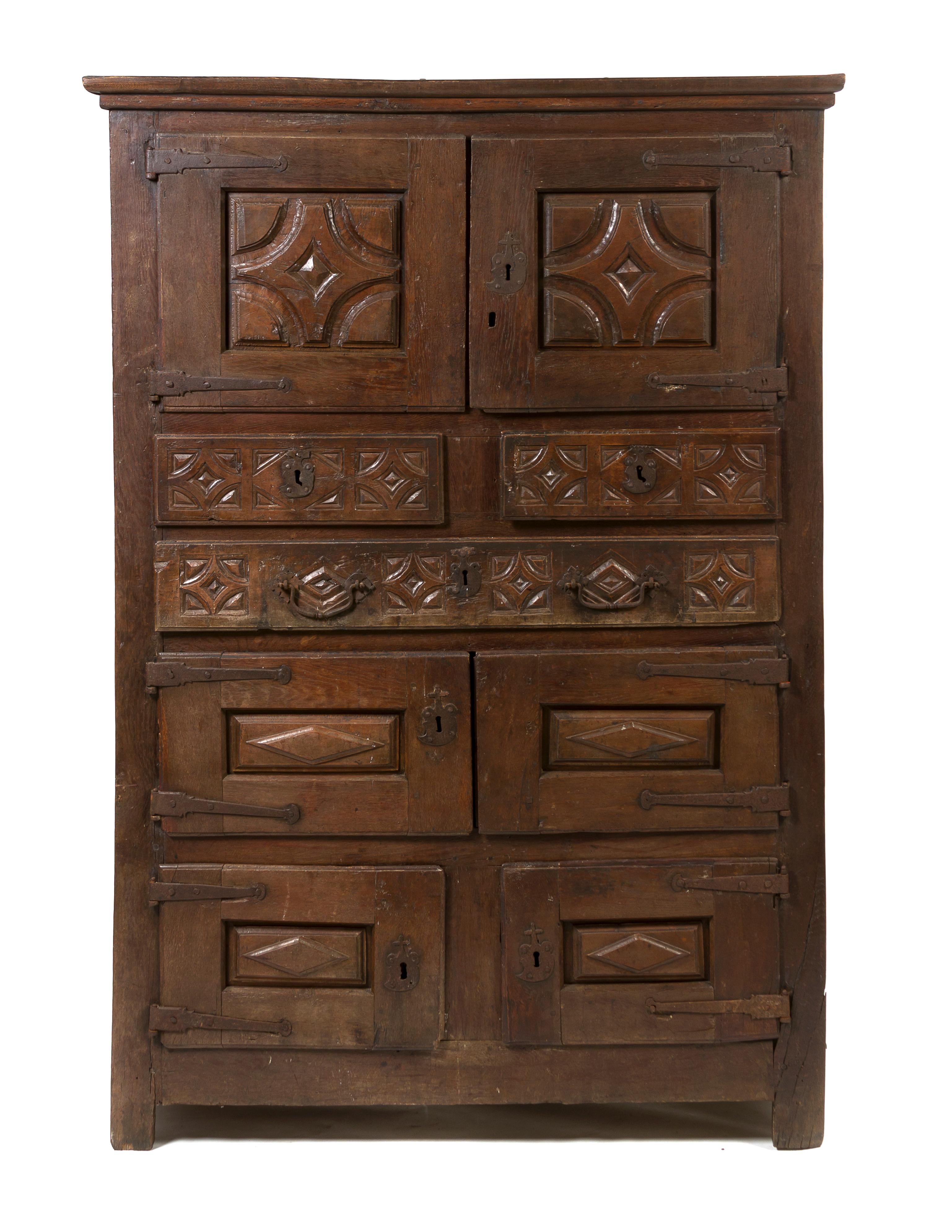 A Spanish Colonial Hardwood Cabinet, Height 76 x width 52 1/2 x depth 25 3/4 inches.