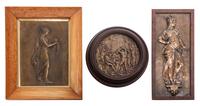 A Cast Metal Plaque, , depicting a Classical female set in a maple frame, together with two additional reliefs.