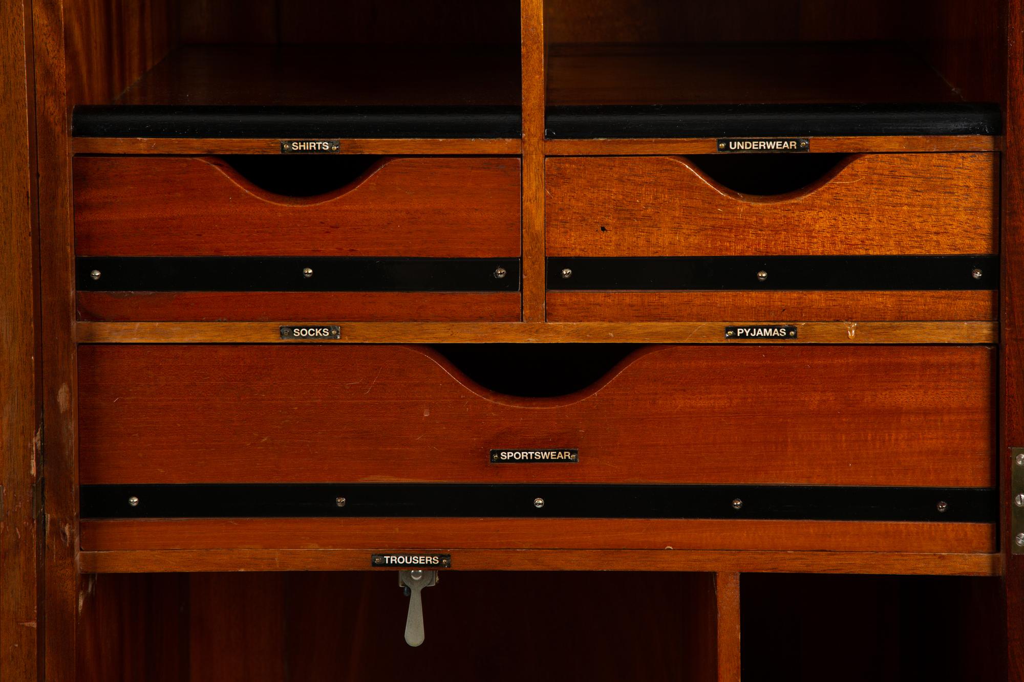 A Mahogany Fitted Gentleman's Wardrobe — EARLY 20TH CENTURY