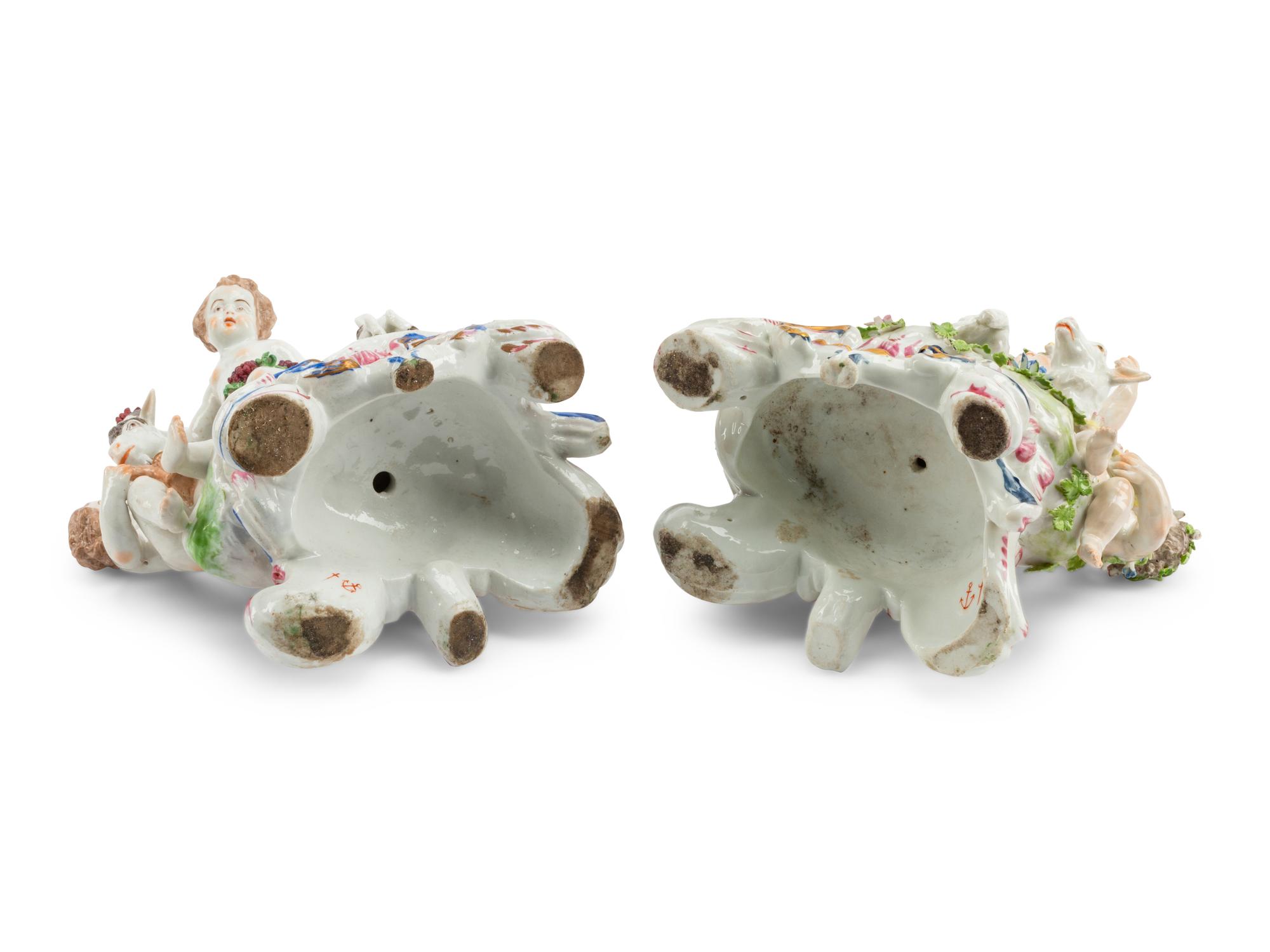 A Pair of Chelsea Porcelain Figural Groups