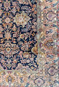 A Kirman Wool Rug