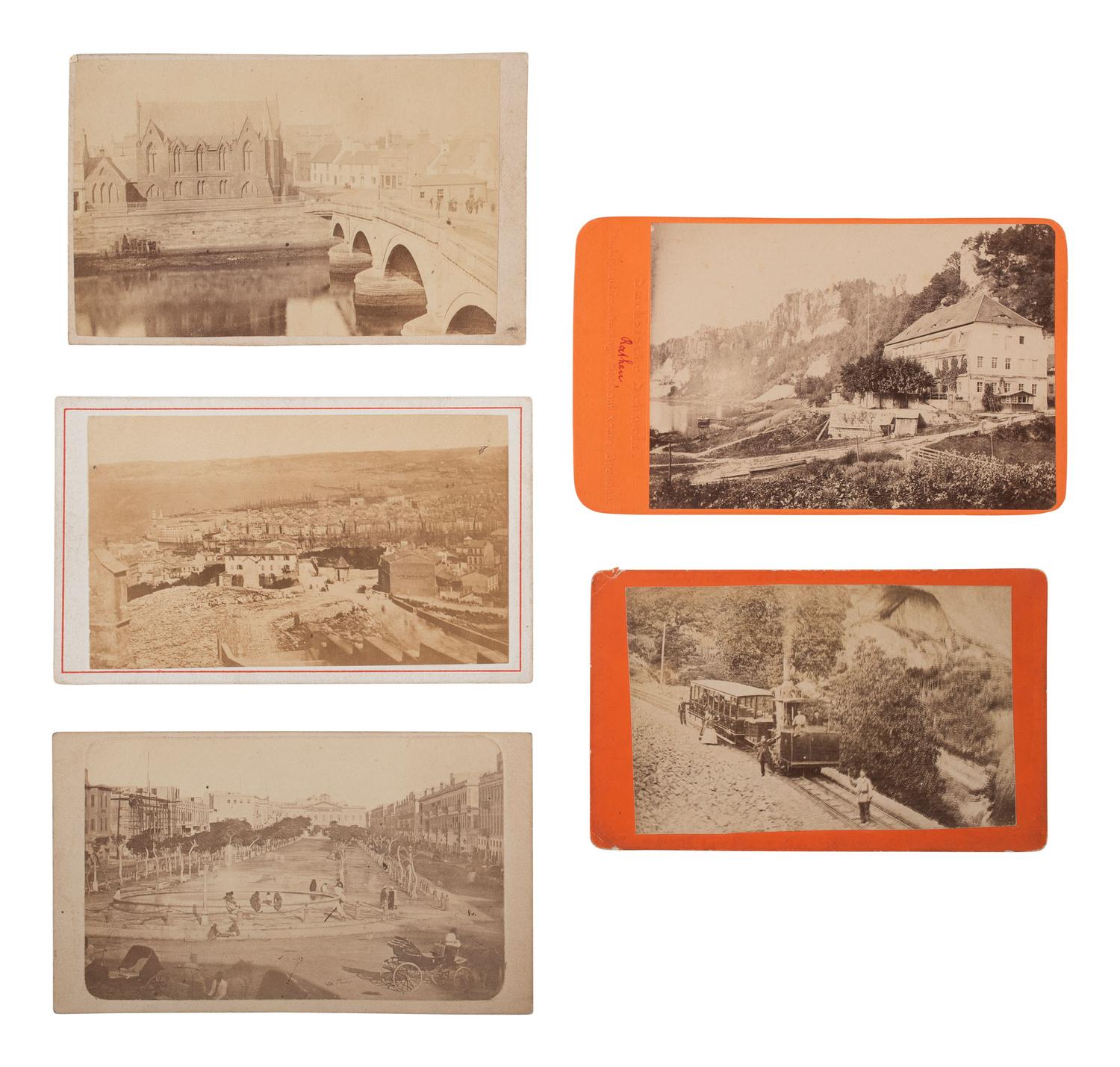 [EARLY PHOTOGRAPHY]. Photographs of events & landmarks in the US and beyond, incl. train derailment