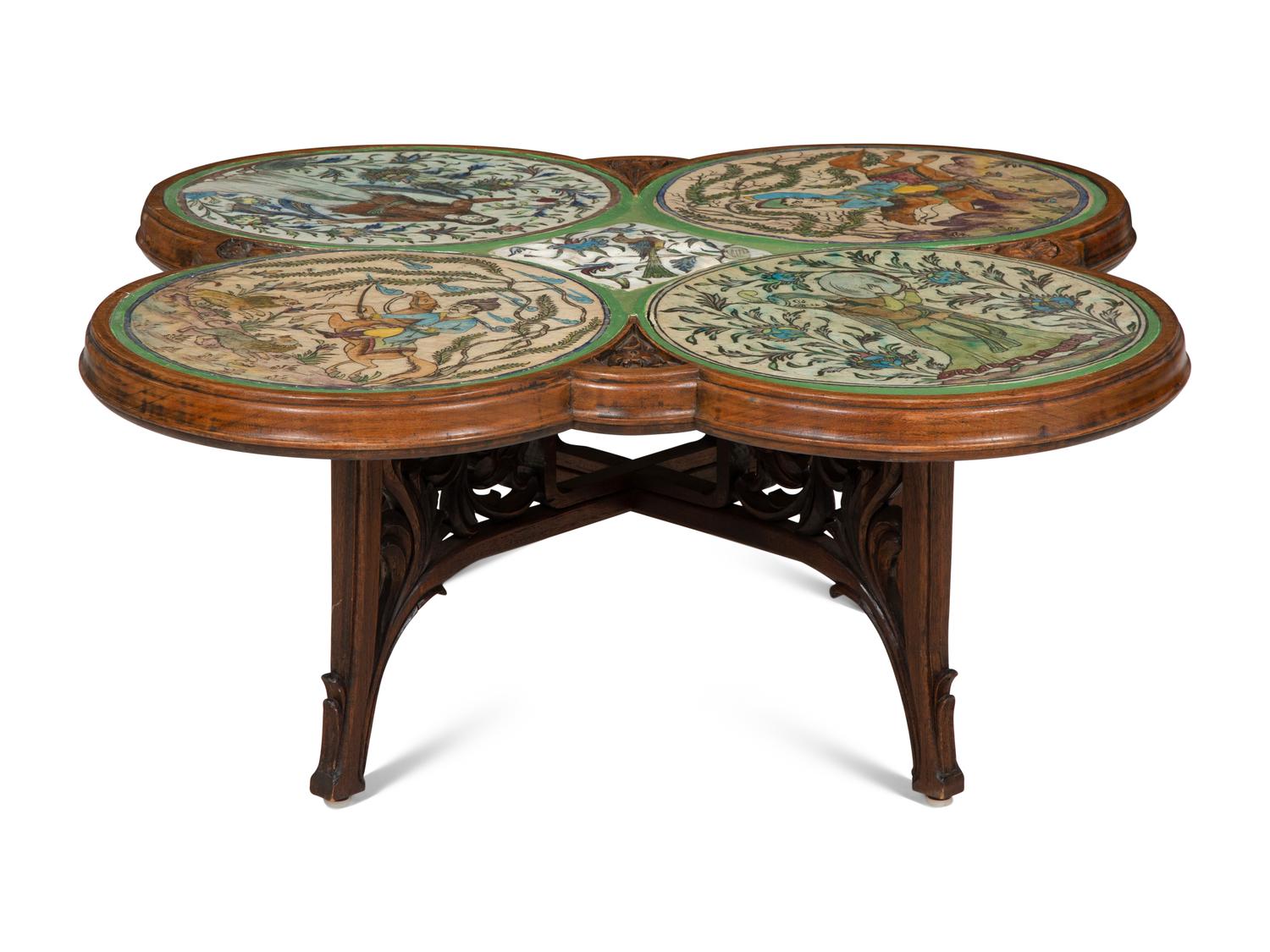 An Art Nouveau Carved Walnut and Persian Tile-Inset Low Table