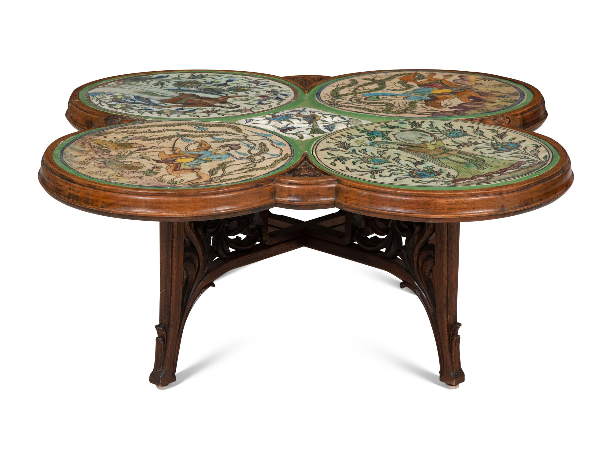 An Art Nouveau Carved Walnut and Persian Tile-Inset Low Table