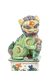 A Pair of Famille Verte Porcelain Figures of Fu Lions