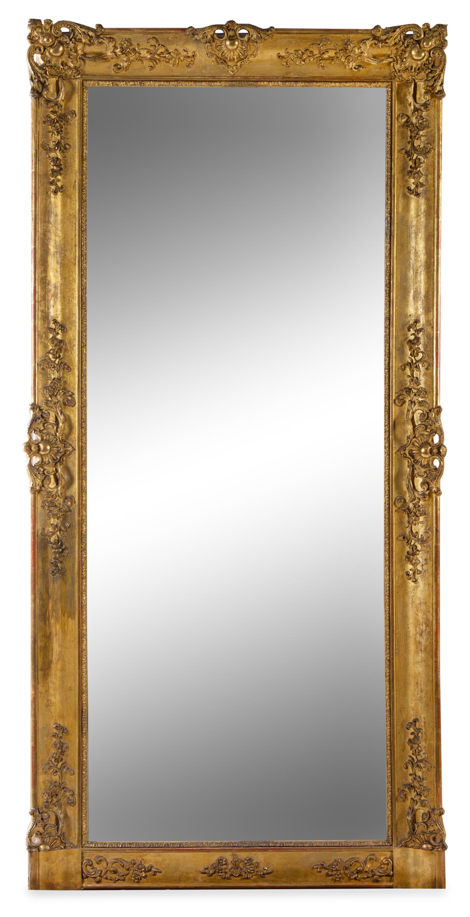 A Continental Giltwood Mirror Height 75 1/4 x width 36 1/2 inches. — 19TH CENTURY
