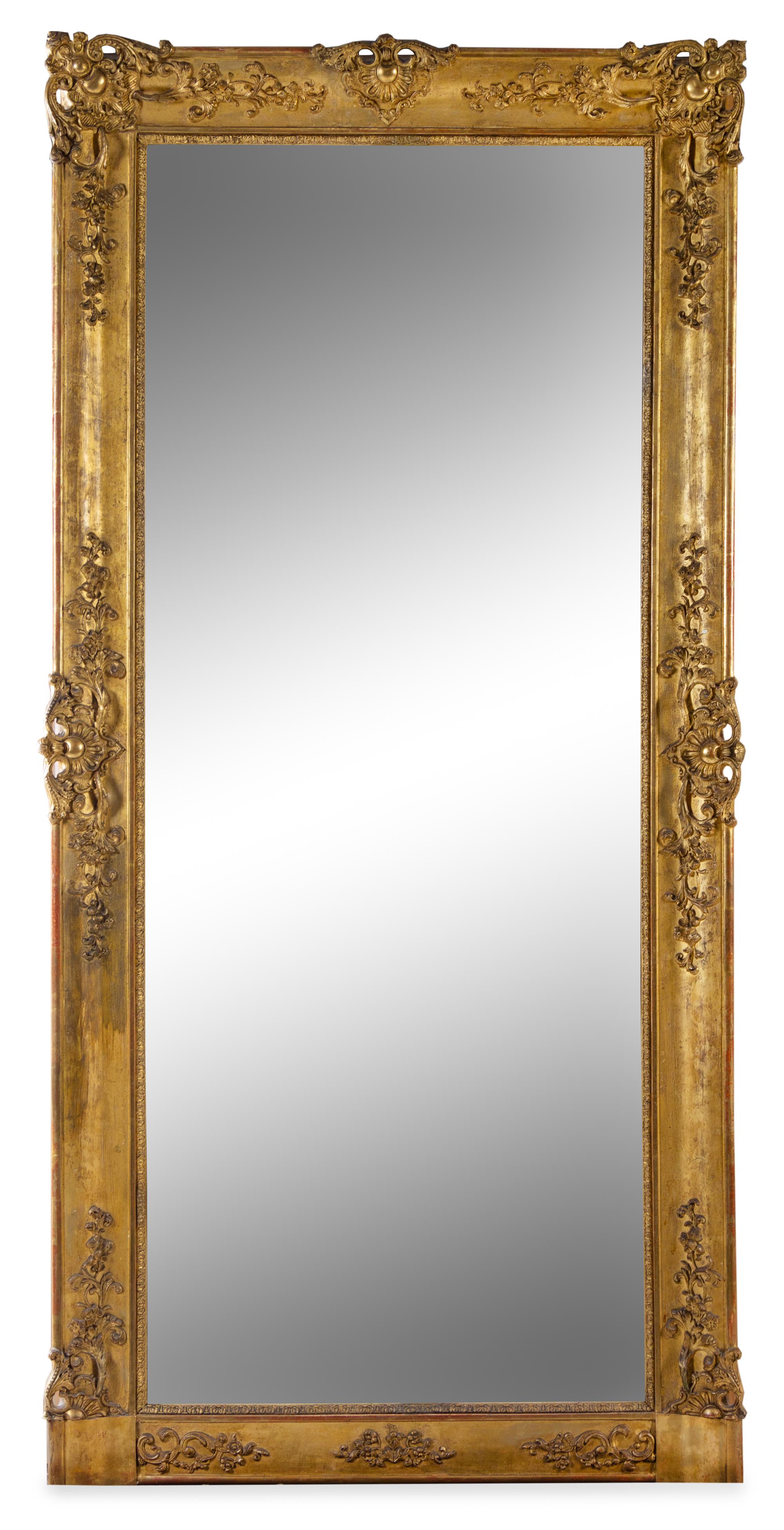 A Continental Giltwood Mirror Height 75 1/4 x width 36 1/2 inches. — 19TH CENTURY