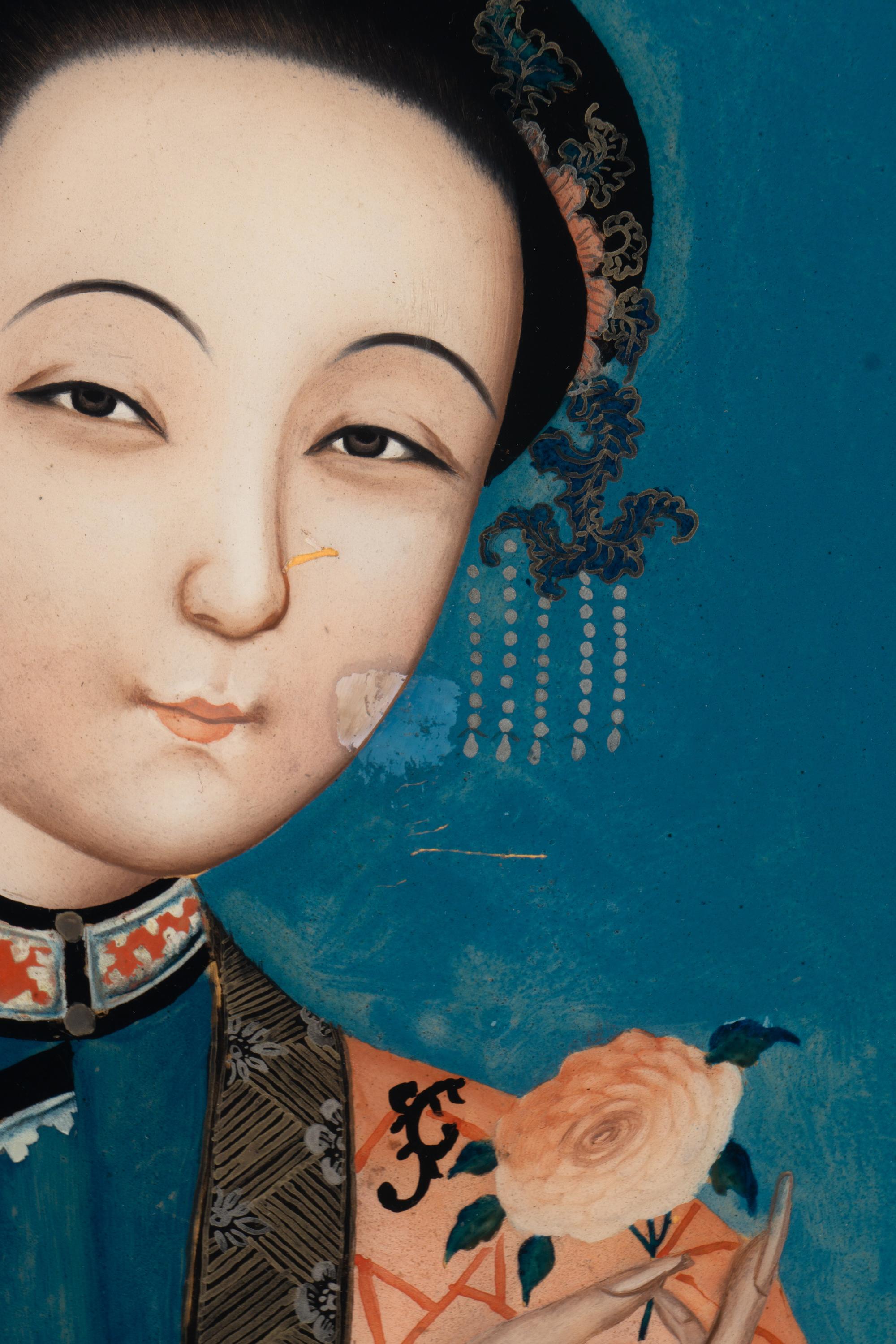 Two Chinese Reverse-Painted Glass Portraits