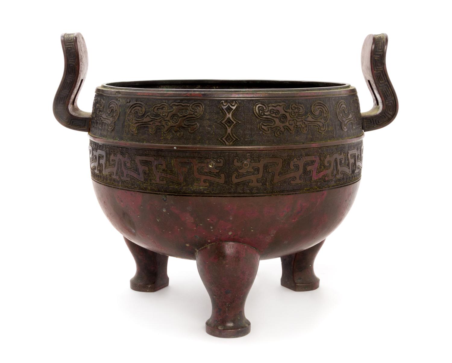 A Bronze Incense Burner Height 9 3/4 inches.