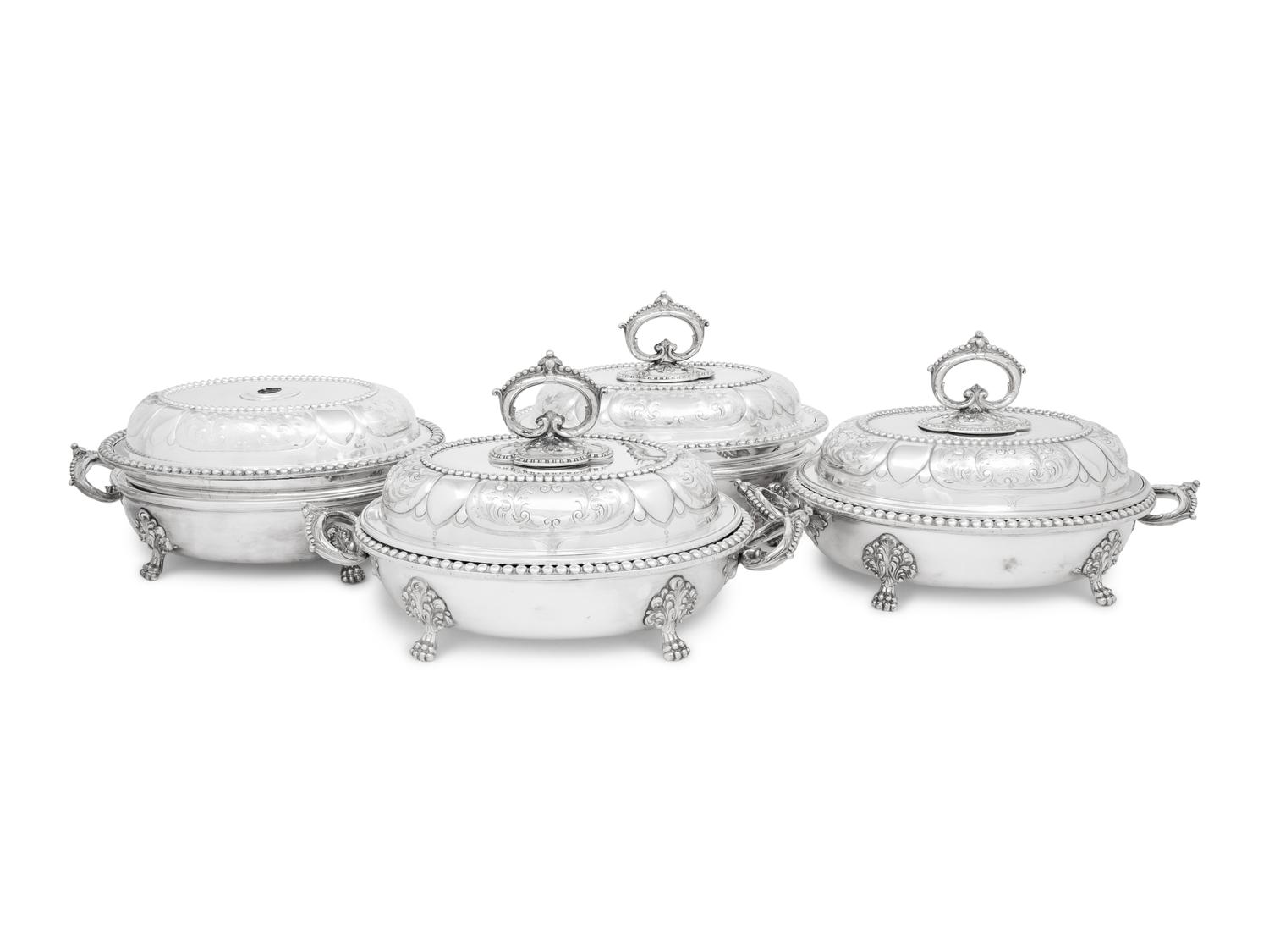 A Set of Four Victorian Silver-Plate Oval Vegetable Dishes with Covers and Liners