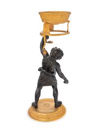 An Italian Gilt and Patinated Bronze Figure of Silenus