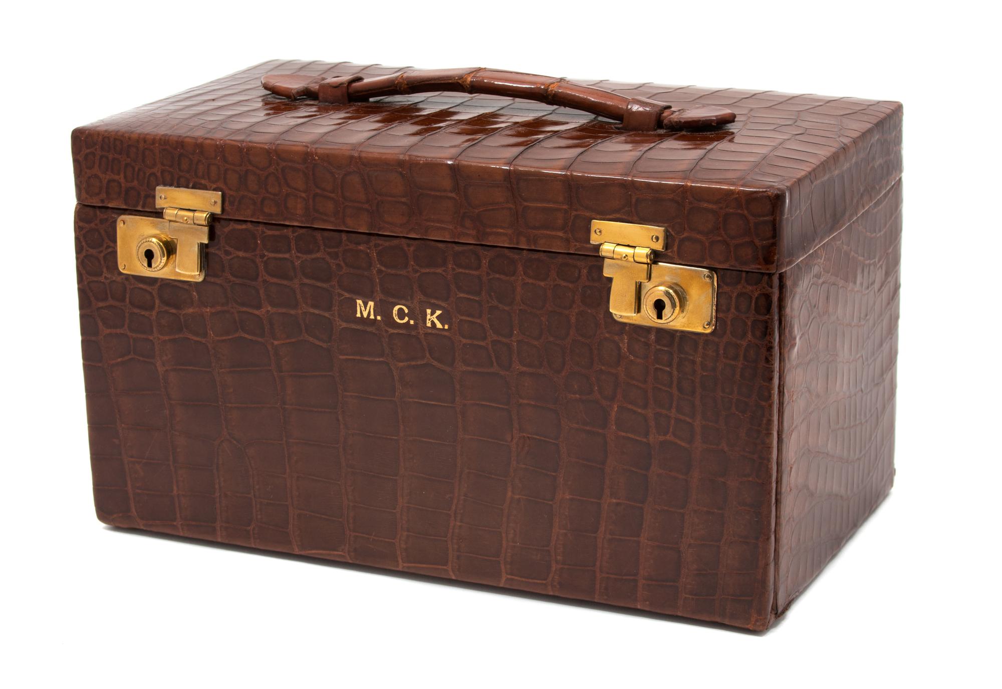 An English Crocodile Cased Silver and Enamel Dressing Case — ADIE BROTHERS LTD., BIRMINGHAM, 1936