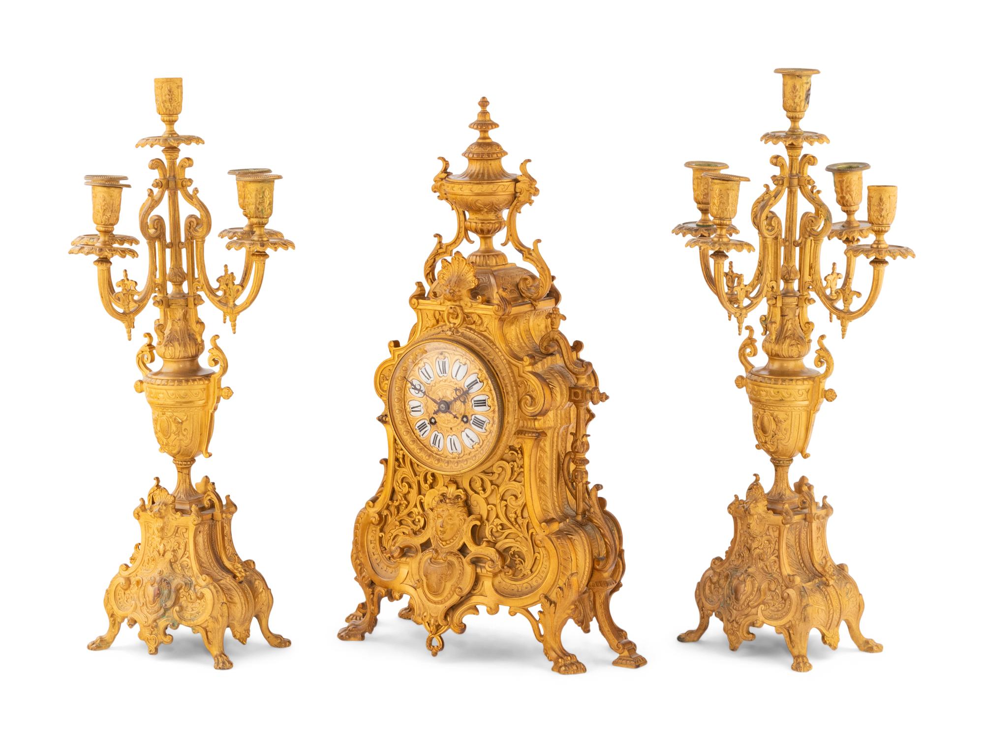 A French Gilt Bronze Clock Garniture