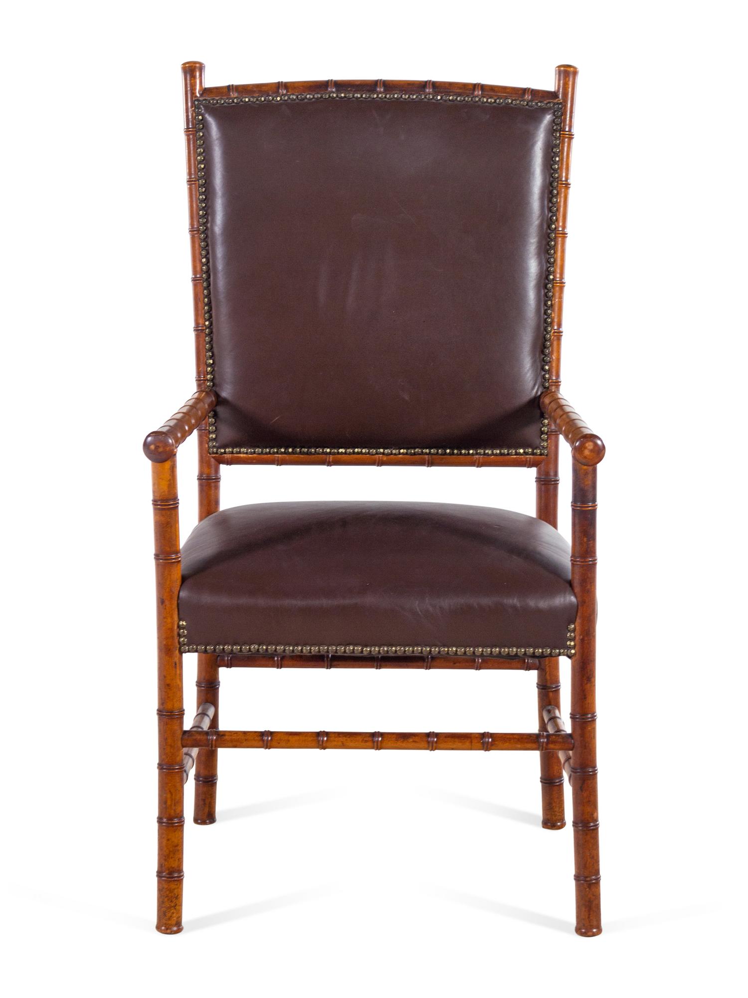 A Leather Upholstered Faux Bamboo Armchair