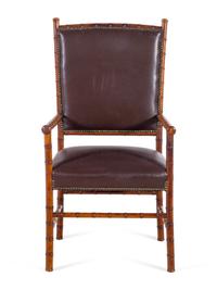 A Leather Upholstered Faux Bamboo Armchair