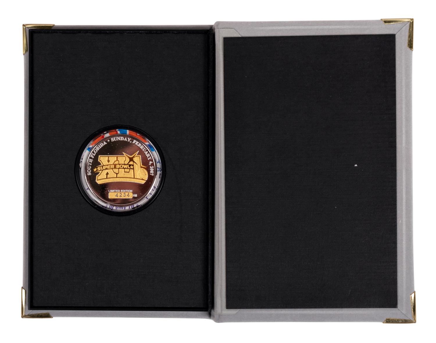 (Sports) A group of football, Super Bowl, and soccer memorabilia, comprising: