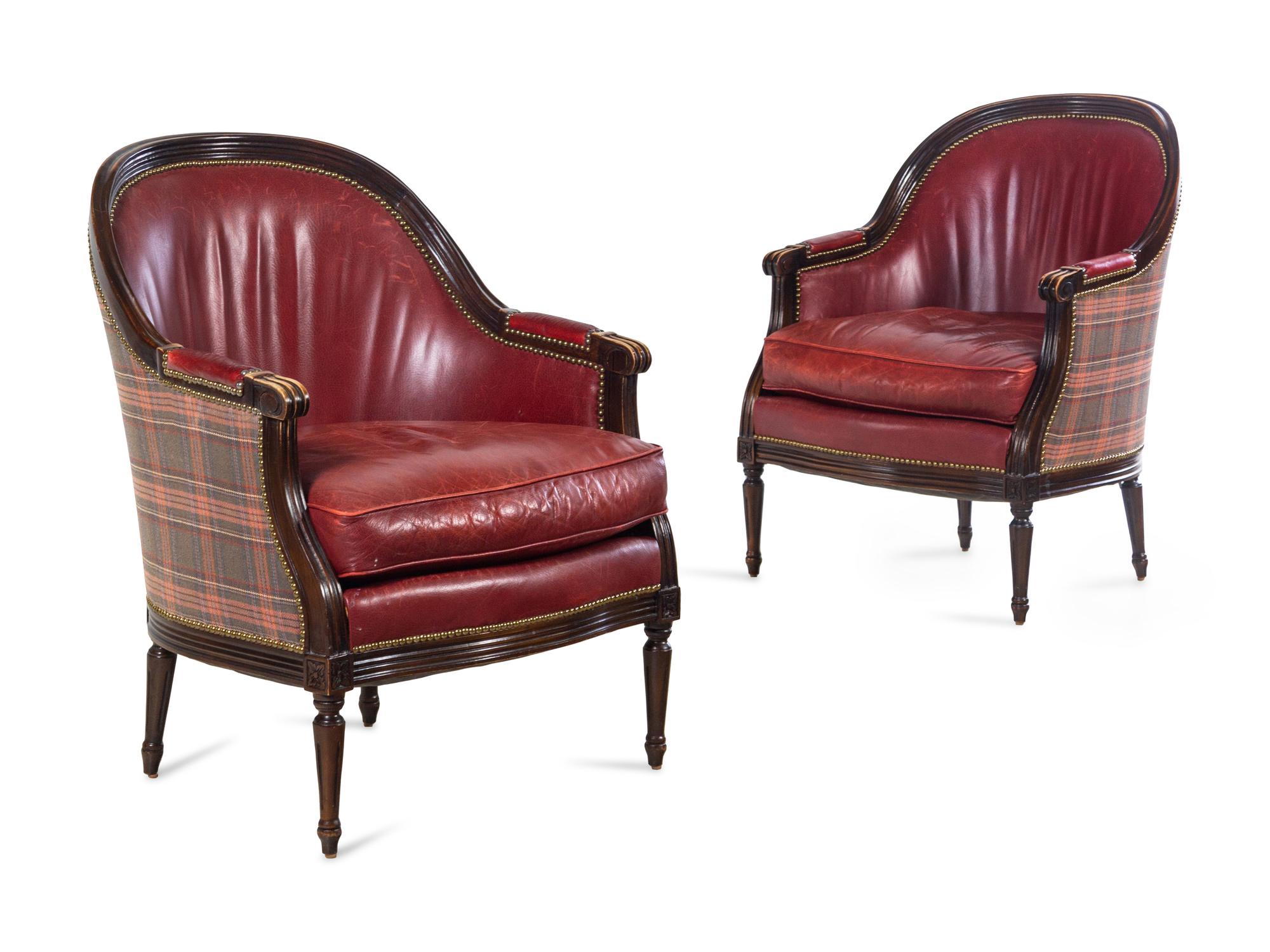 A Pair of Edwardian Style Carved Mahogany Barrel-Back Bergères