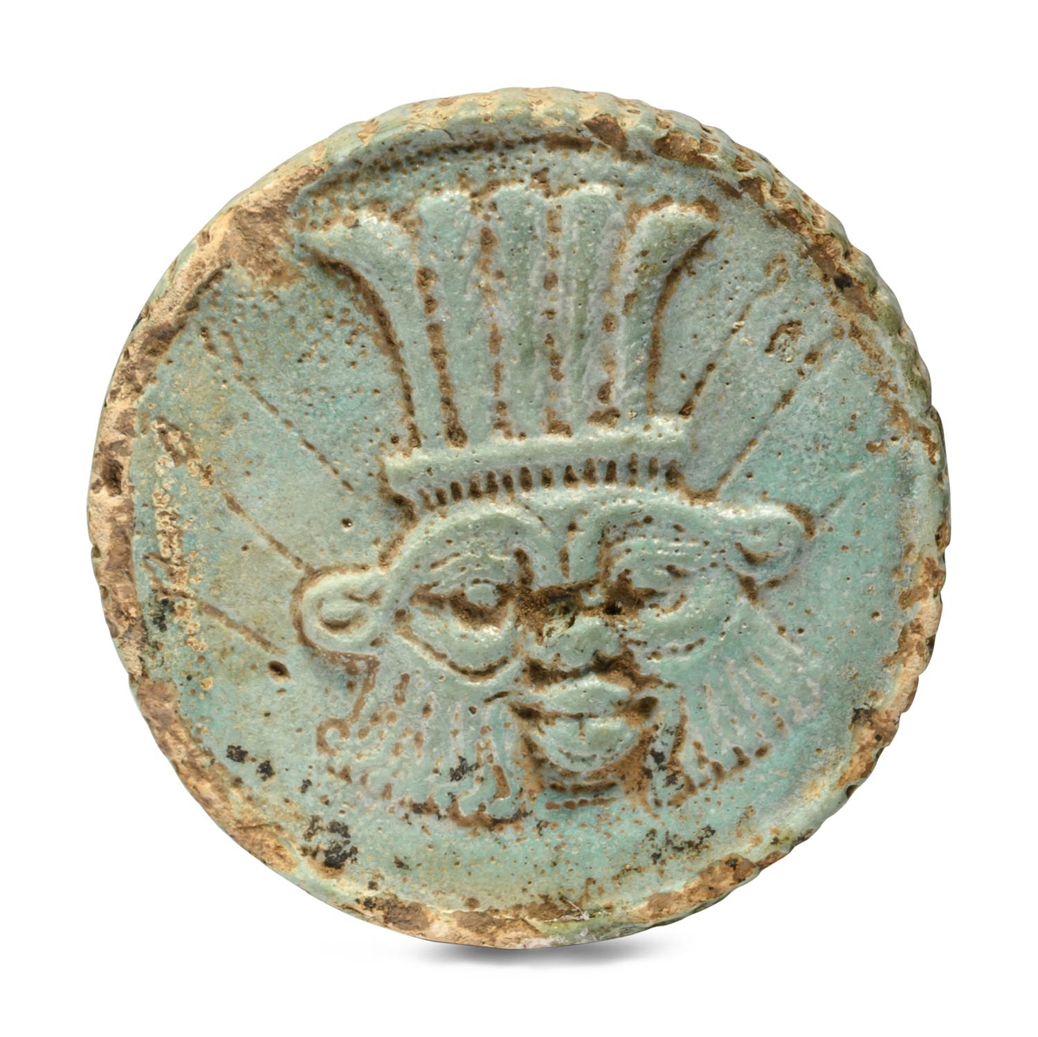 An Egyptian Faience Two-Sided Medallion