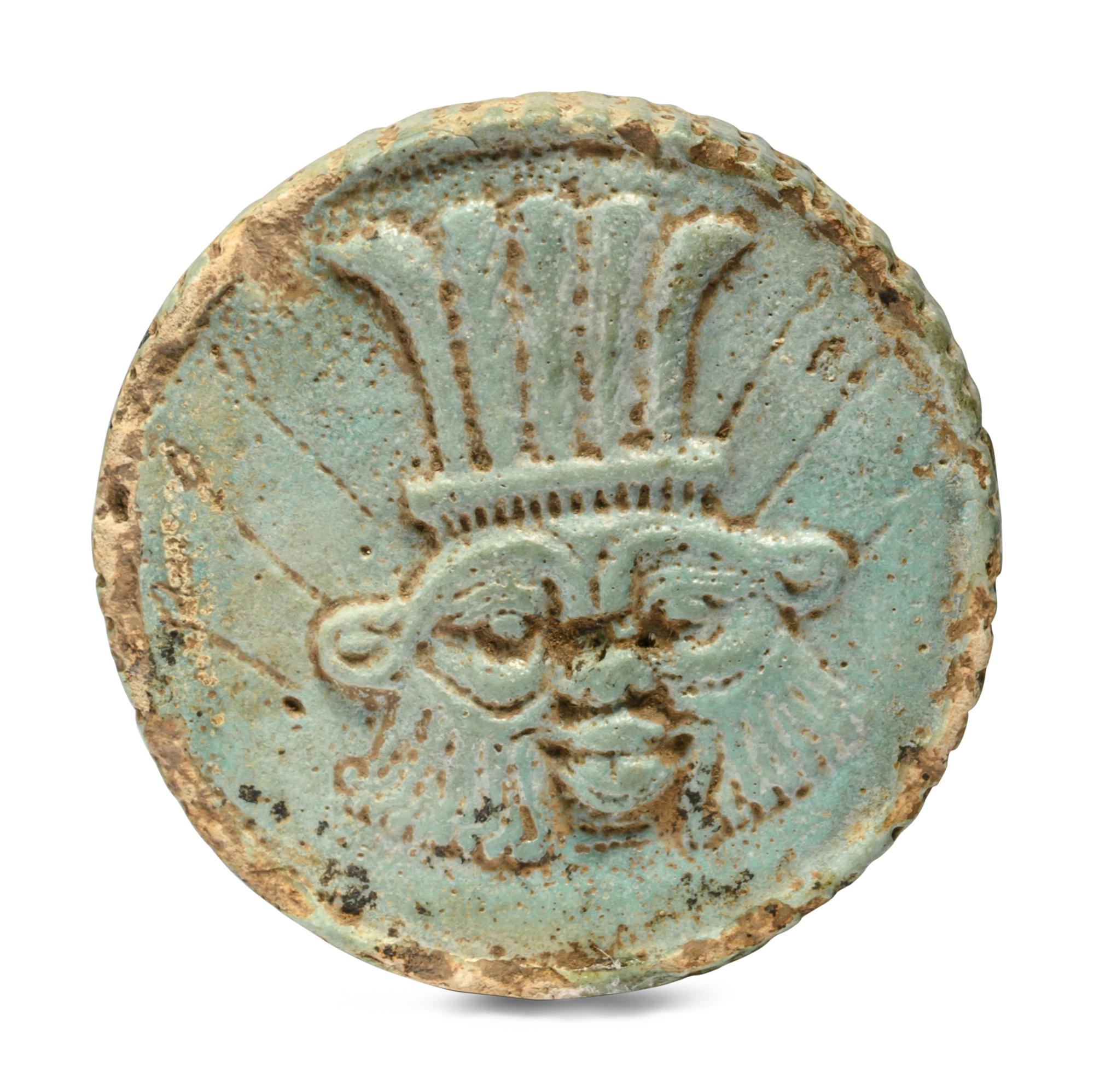 An Egyptian Faience Two-Sided Medallion