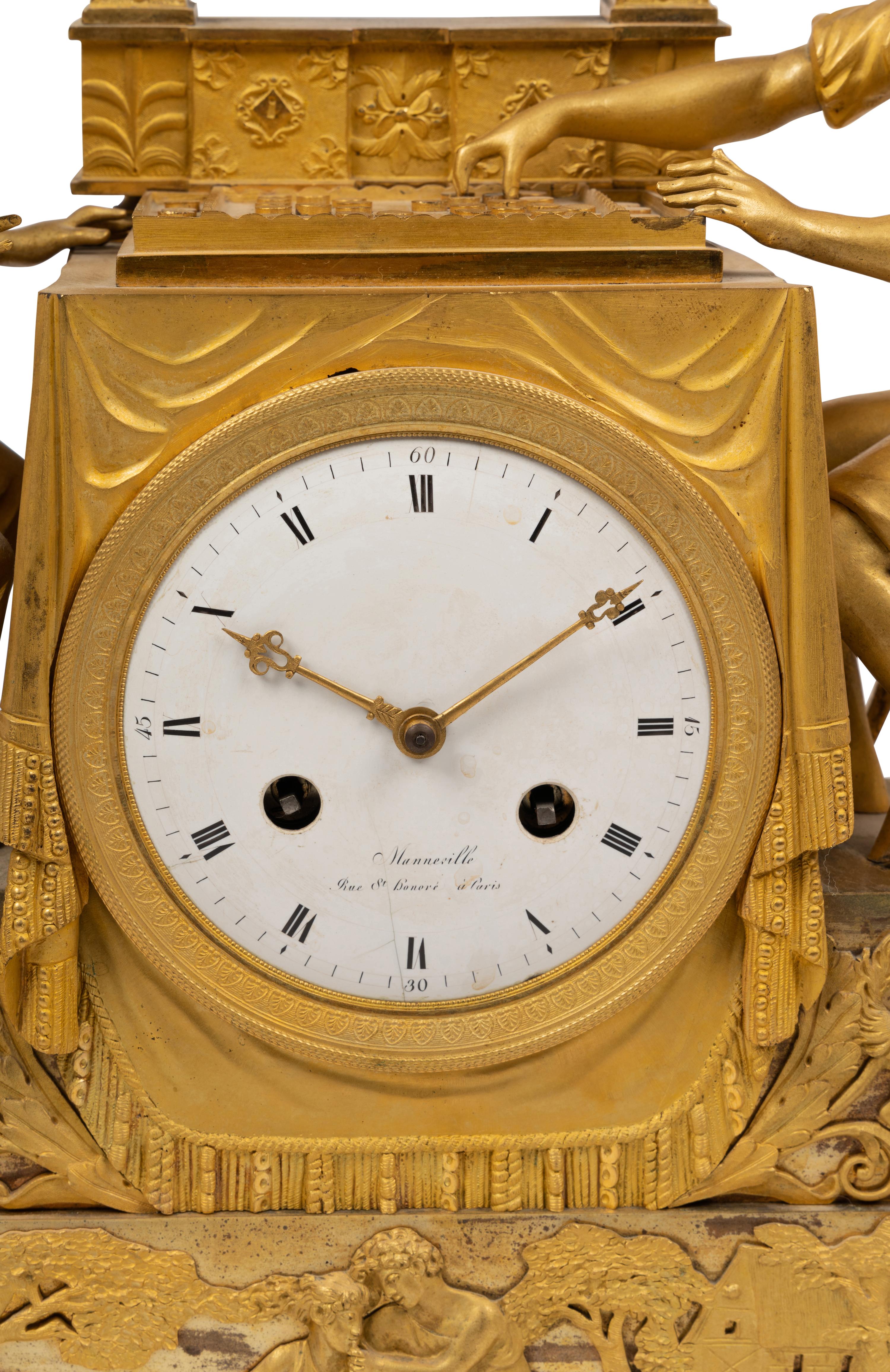 An Empire Gilt Bronze Figural Mantel Clock