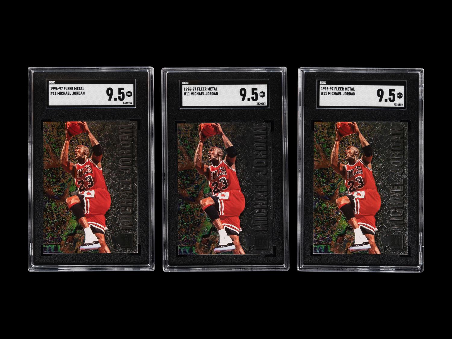 A Group of Three 1996-97 Fleer Metal Michael Jordan Basketball Cards No. 11 (SGC 9.5 MT+)