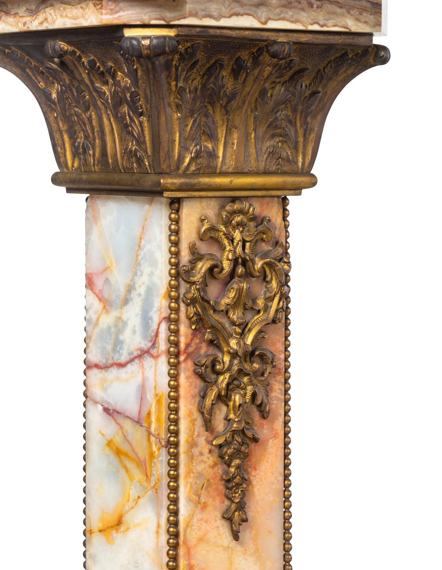 A Neoclassical Gilt Bronze Mounted Onyx Pedestal