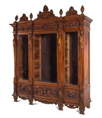 An Italian Renaissance Style Carved Walnut Cabinet