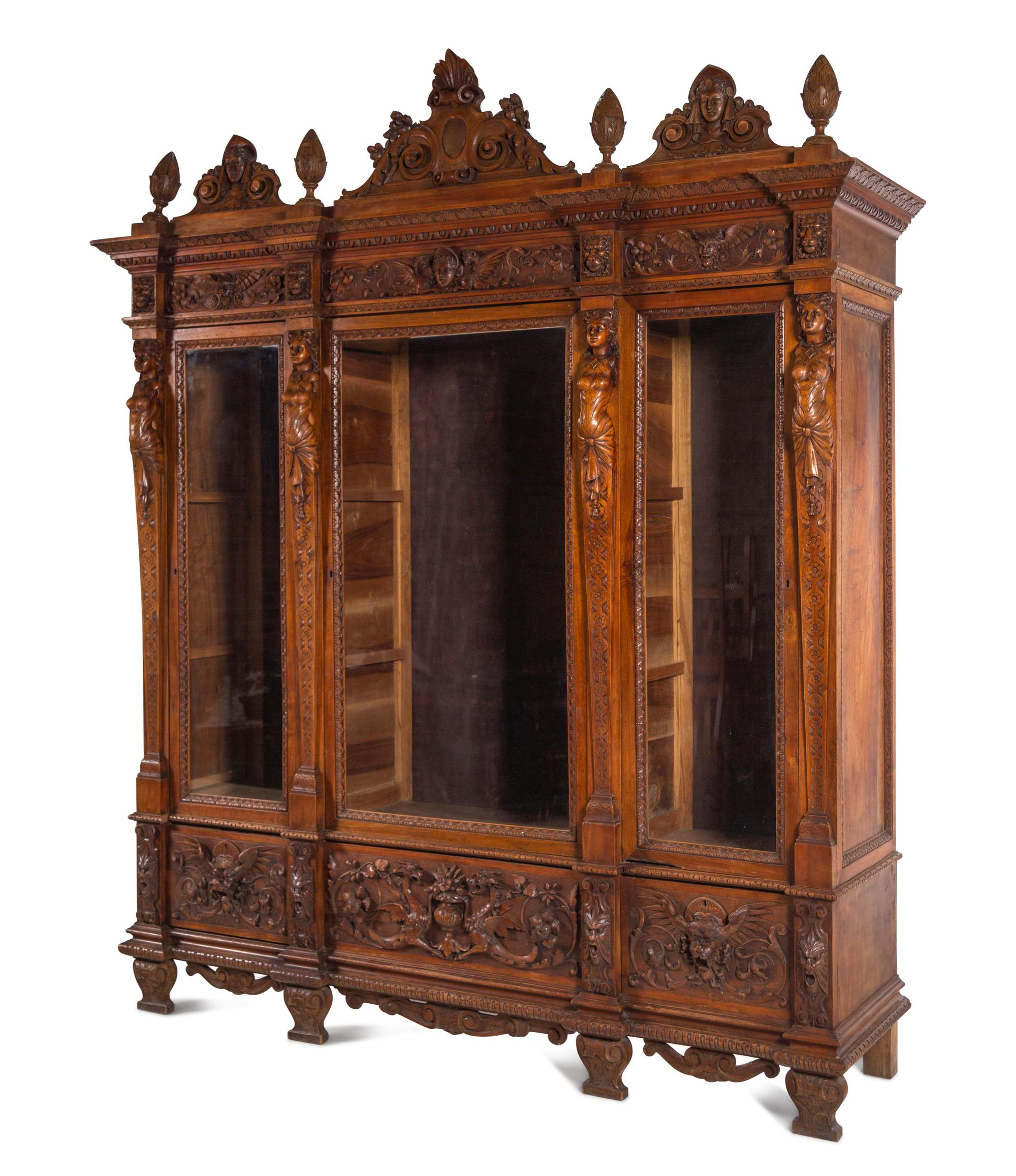 An Italian Renaissance Style Carved Walnut Cabinet