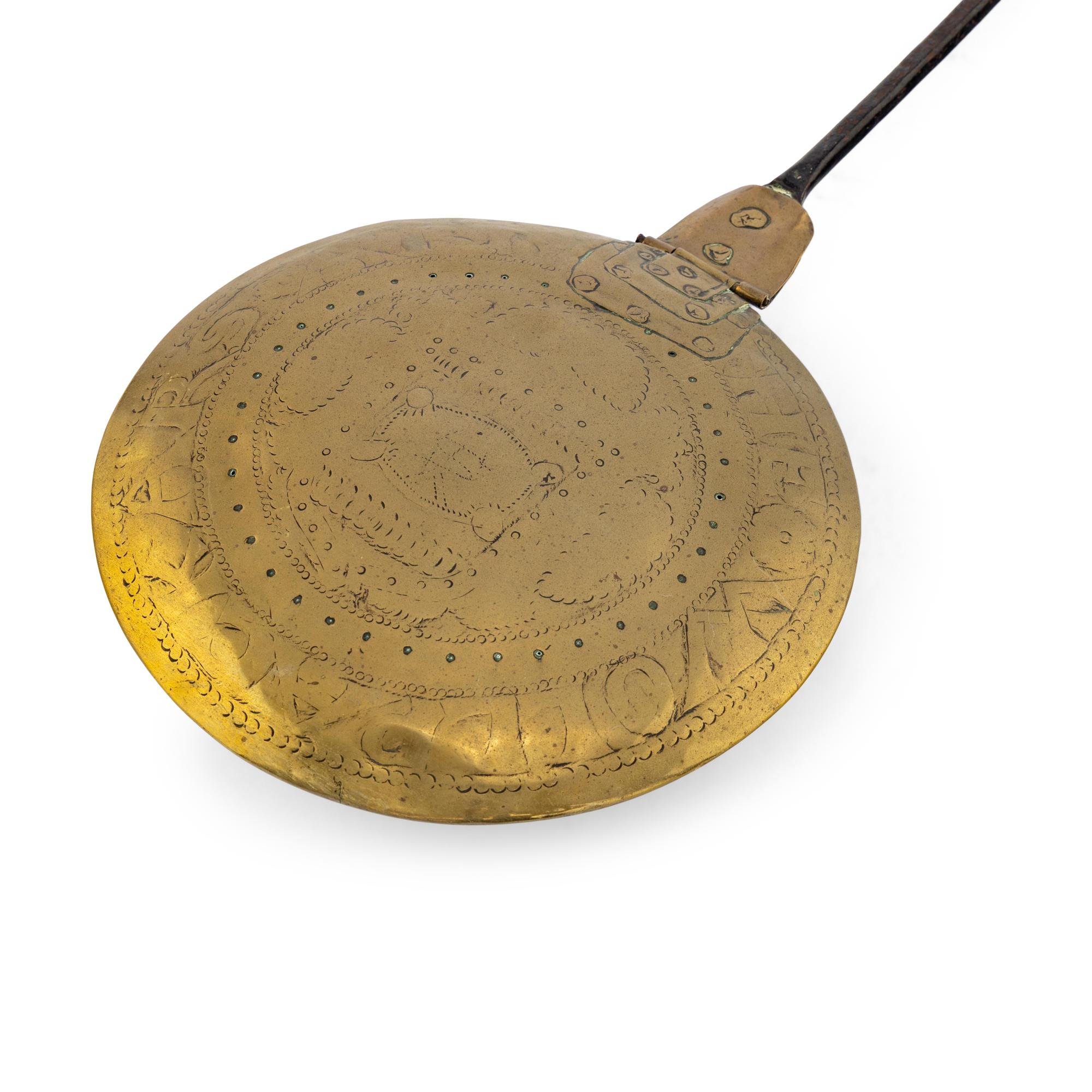A Brass and Iron Bed Warmer
