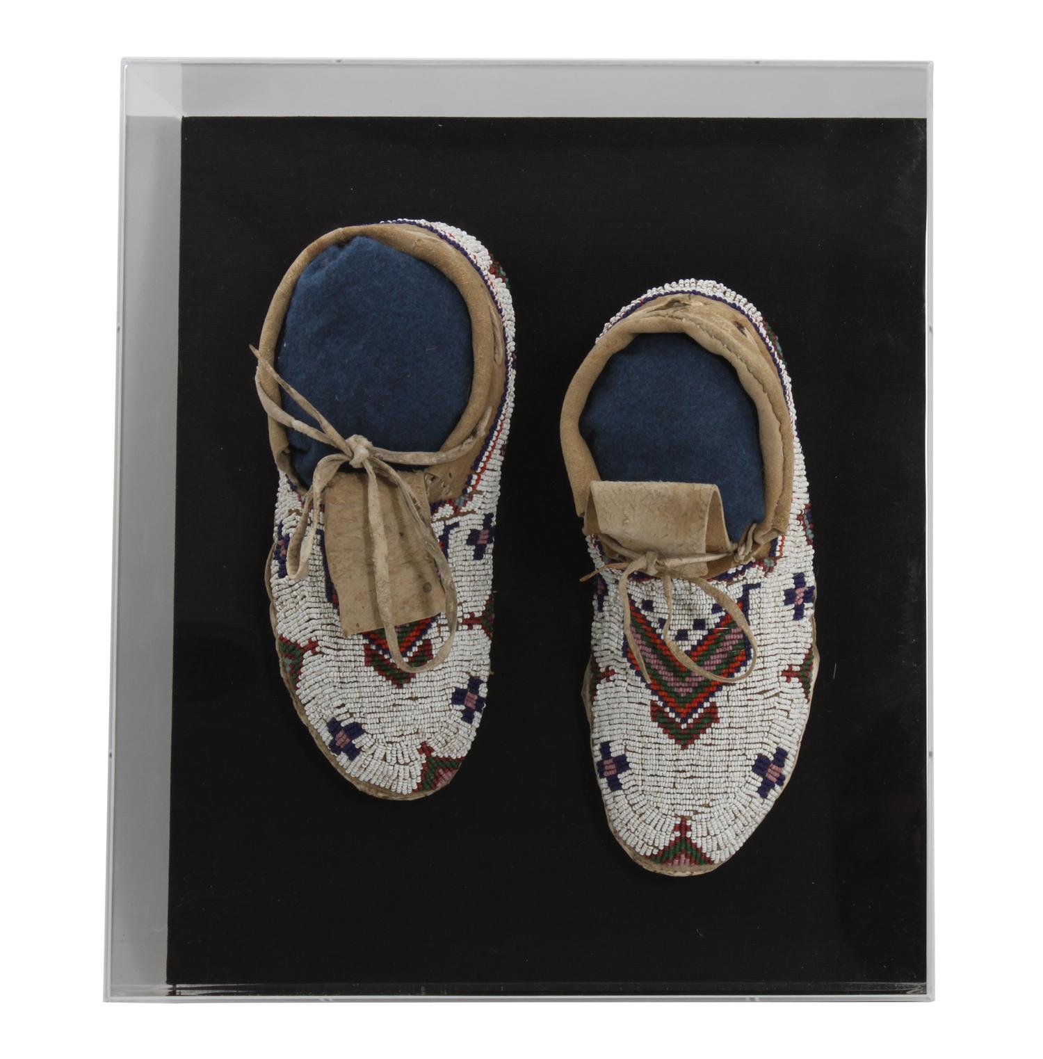 A Pair of Plateau Style Mocassins Length 10 inches — FIRST QUARTER 20TH CENTURY