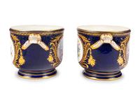 A Pair of Sèvres Style Porcelain Cache Pots