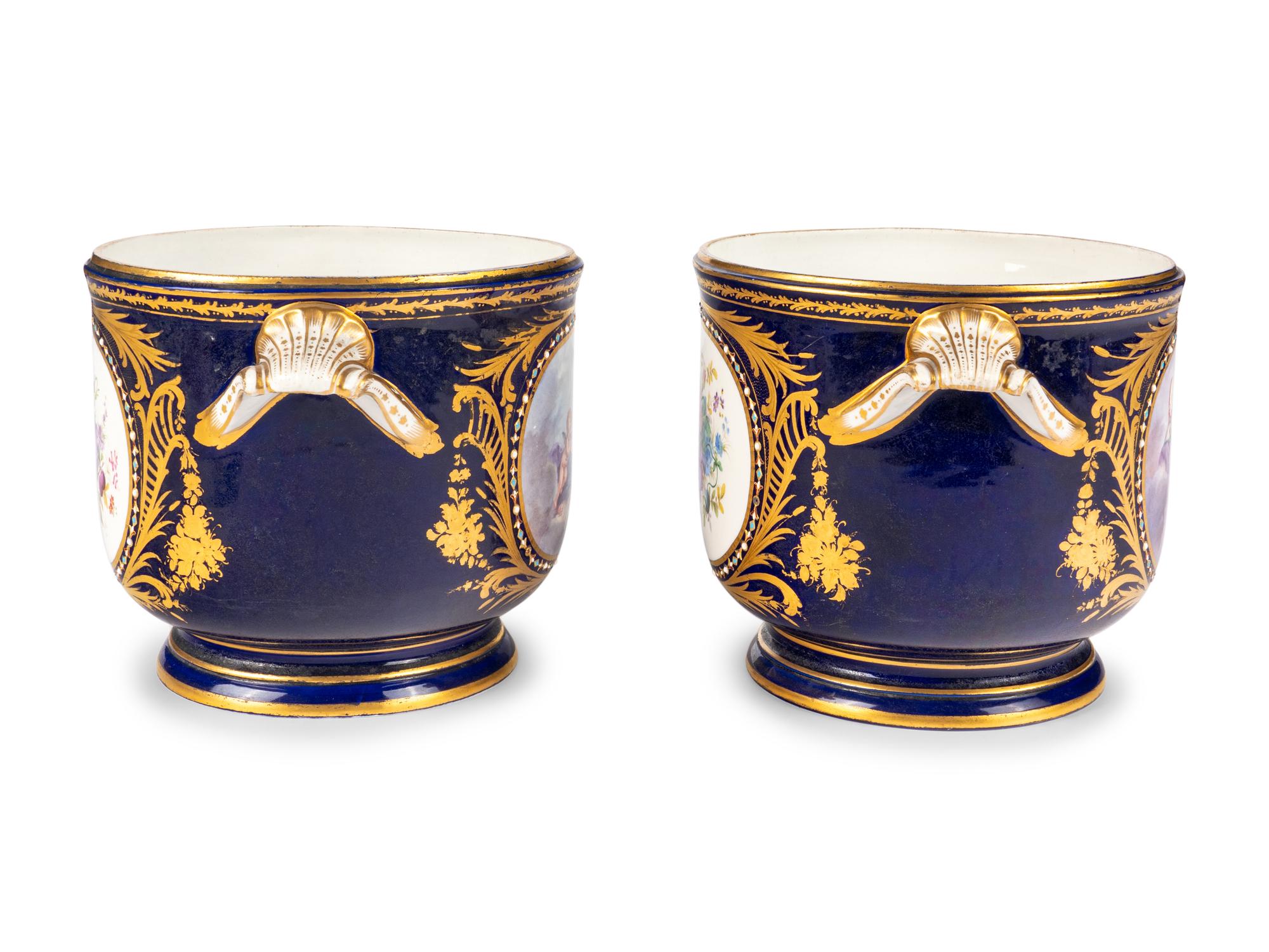 A Pair of Sèvres Style Porcelain Cache Pots