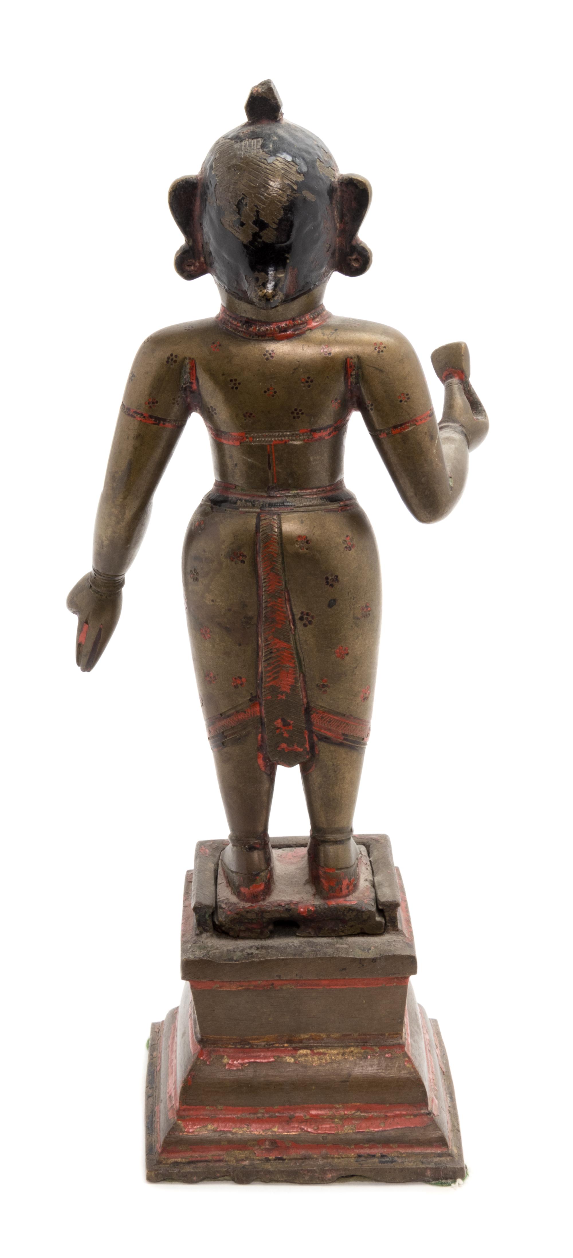 An Indian Bronze Figure Height overall 14 3/4 inches. — BENGAL, 18TH/19TH CENTURY