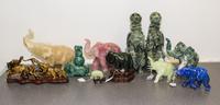 A Group of Eleven Hardstone Elephant Figures Height of tallest 12 inches.