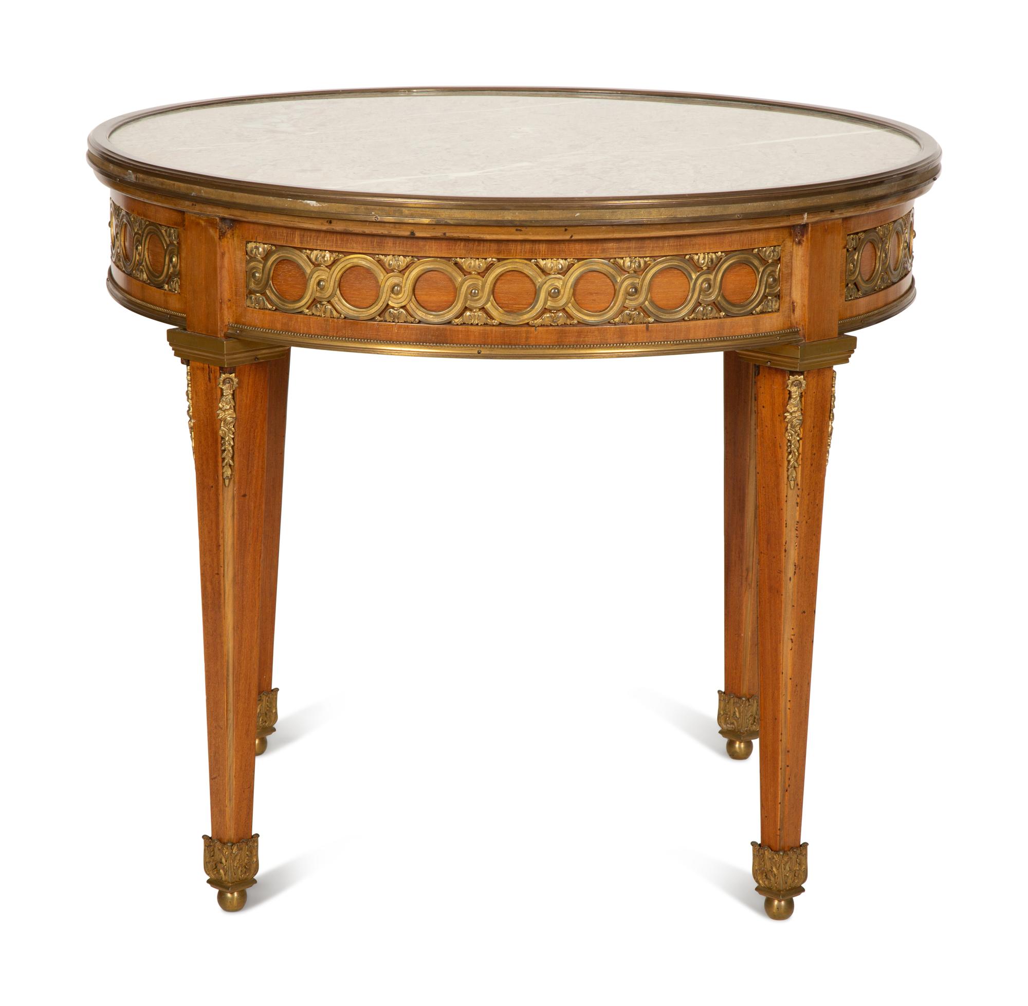 A Louis XVI Style Gilt Bronze Mounted Mahogany Marble-Top Guéridon