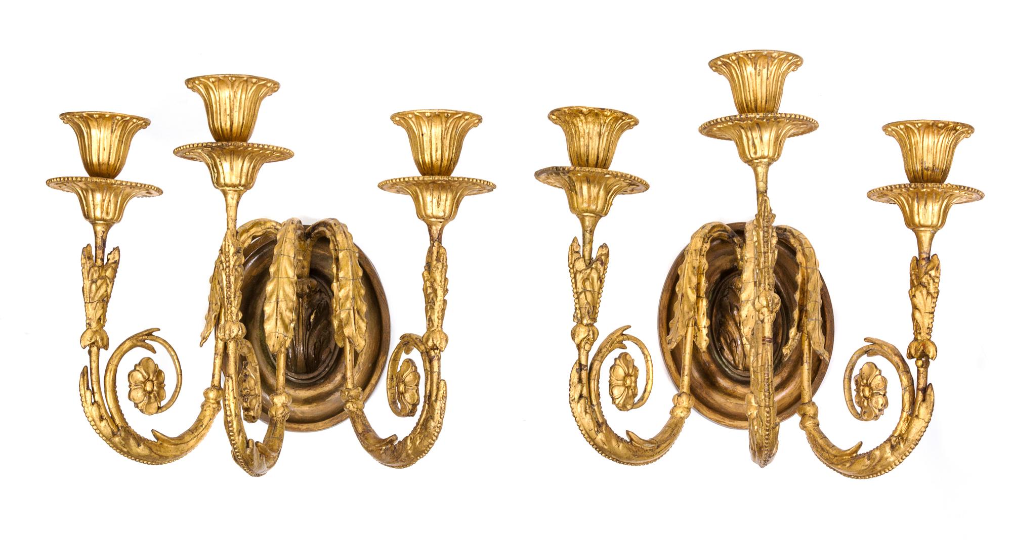A Pair of Louis XVI Style Gilt Plaster Three-Light Wall Sconces Height 10 1/2 inches. — 19TH CENTURY