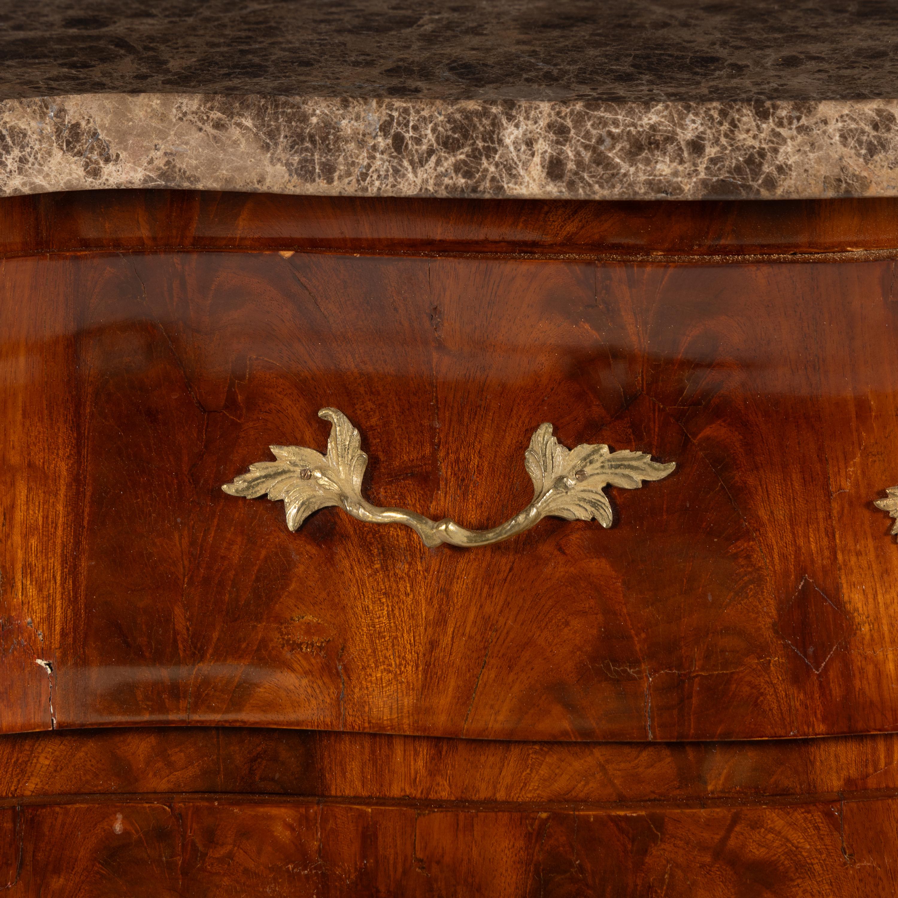 A Louis XV Style Gilt Bronze Mounted Part Ebonized Mahogany Marble-Top Bombé Chest of Drawers