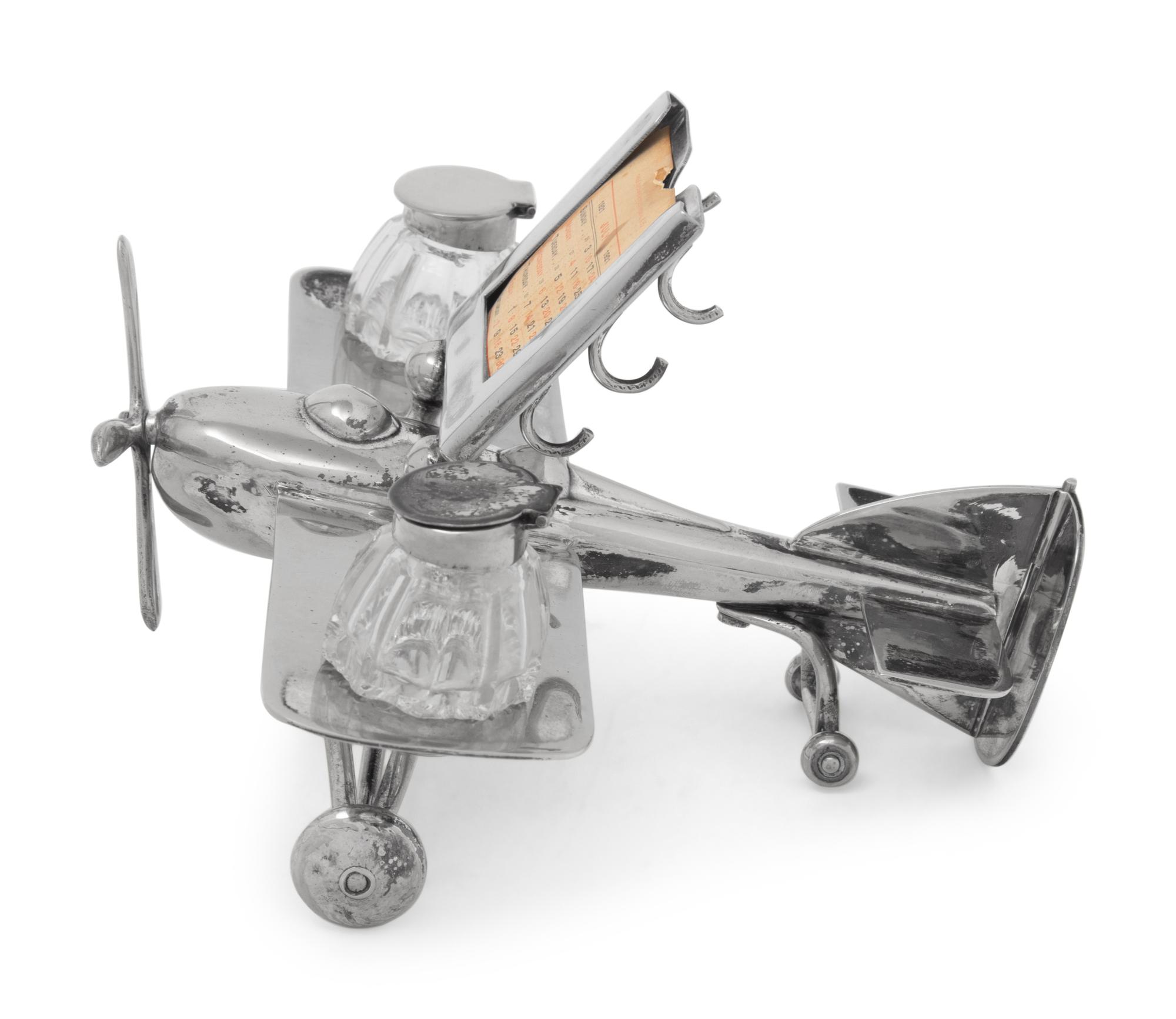 A Silver-Plate Airplane Form Ink-Well and Desk Calendar