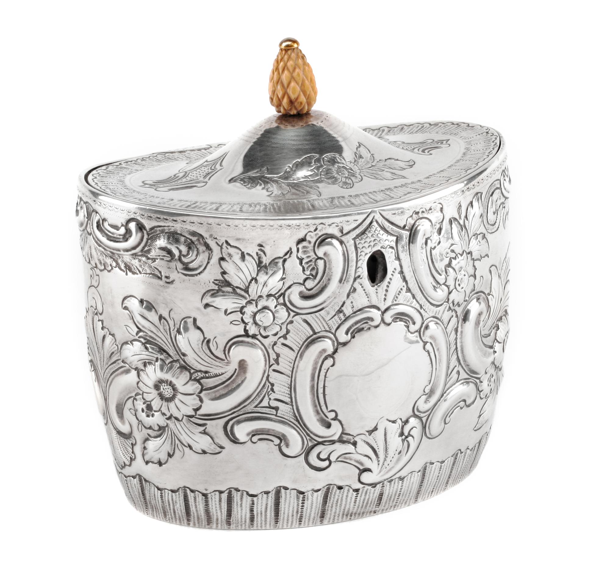 An English Silver Tea Caddy, John Schofield, London, 1794, the oval domed lid with a pinecone finial, the body bearing a vacant cartouc