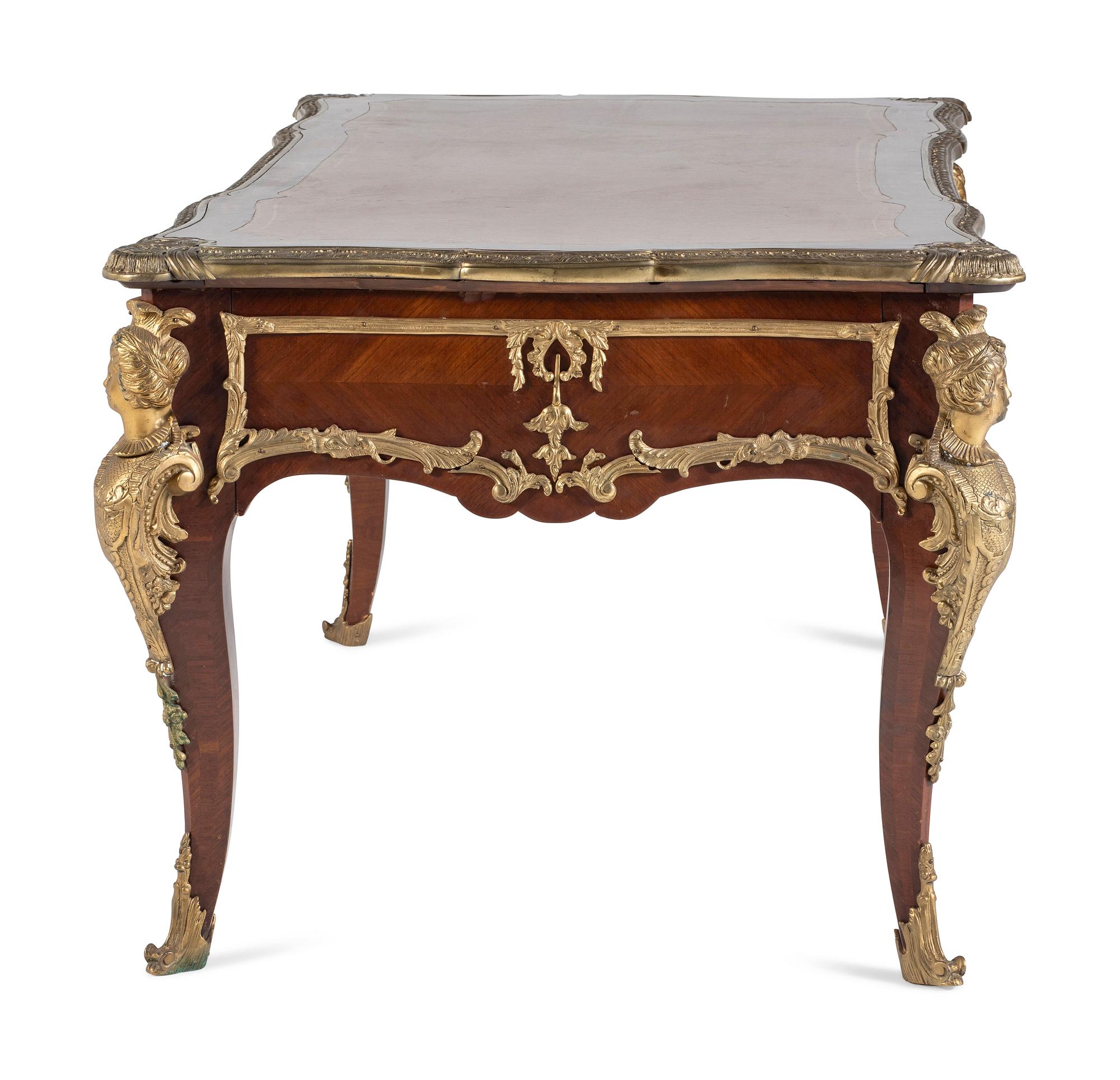 A Louis XV Style Gilt Bronze Mounted Mahogany Bureau Plat