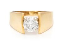 A 14 Karat Yellow Gold and Diamond Solitaire Ring, 4.30 dwts.