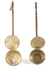 Two Engraved Brass and Wood Bed Warmers