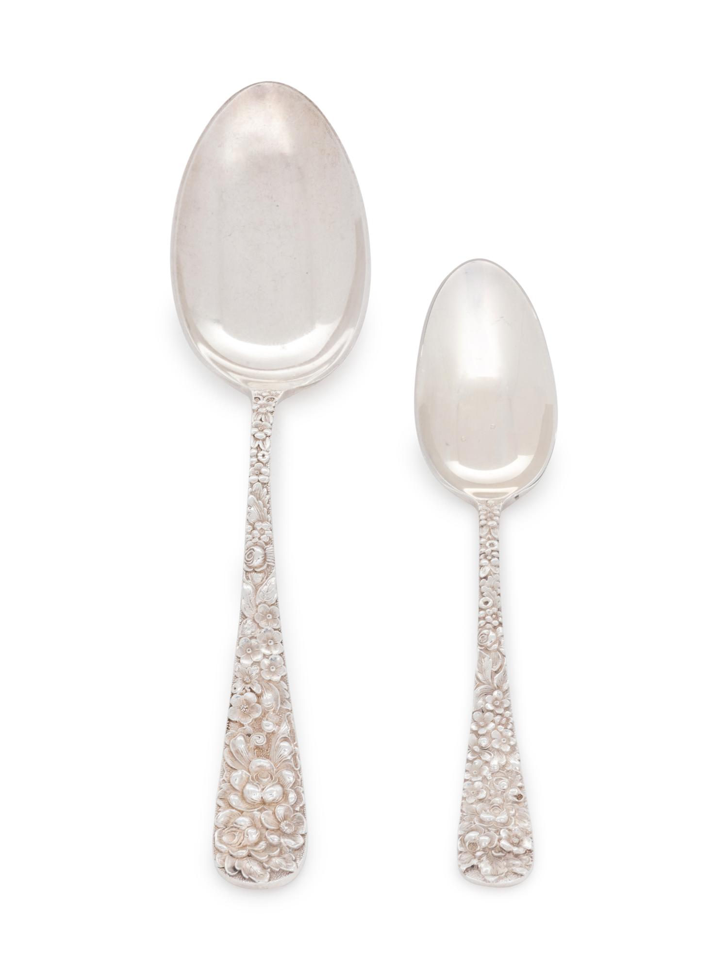 in the Rose pattern, comprising: 1 fish fork 1 oyster fork 2 serving spoons 1 ice cream spoon 1 iced tea spoon 1 master butter spreader 3 dessert spoons 7 teaspoons 2 five o'clock spoons 1 grapefruit spoon 20 pieces total.