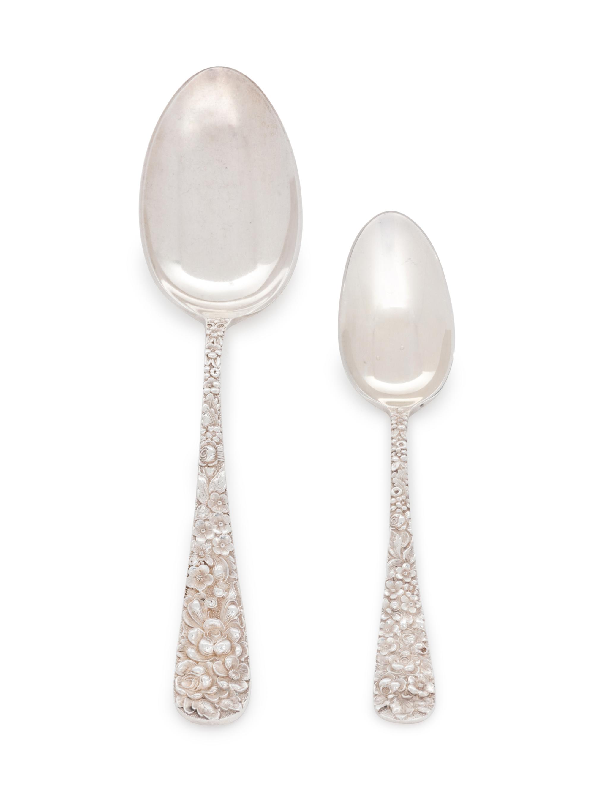 in the Rose pattern, comprising: 1 fish fork 1 oyster fork 2 serving spoons 1 ice cream spoon 1 iced tea spoon 1 master butter spreader 3 dessert spoons 7 teaspoons 2 five o'clock spoons 1 grapefruit spoon 20 pieces total.