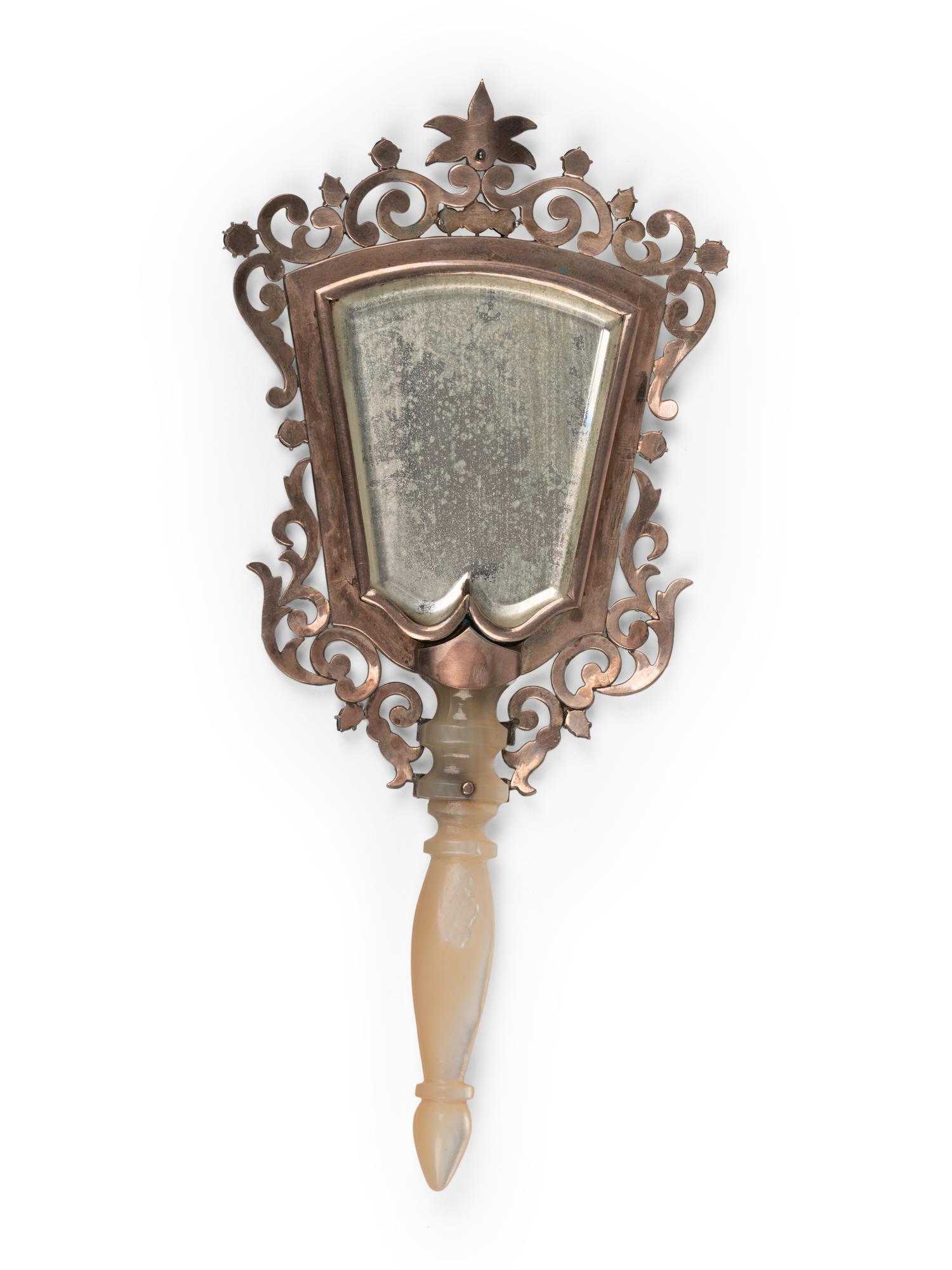 A Continental Mother-of-Pearl Handled Garnet-Inset Mirror