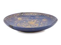 A Large Gilt Decorated Powder Blue Glazed Porcelain Charger